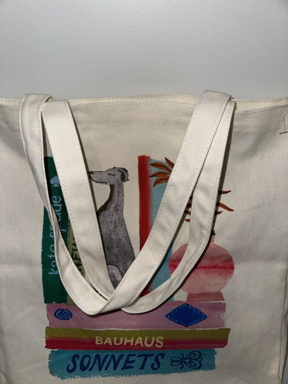 kate spade Ivory Multi Bookshelf Dog Figurine Canvas Tote Bag - Picture 5 of 9
